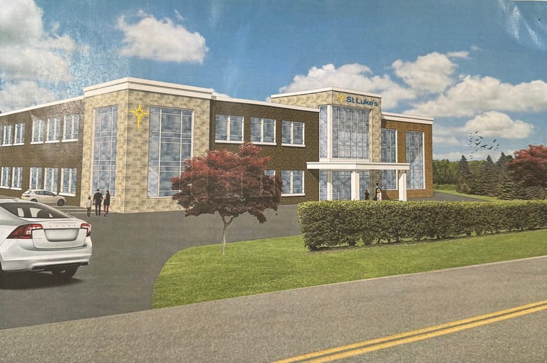 Architectural rendering of a modern multi-story stone and brick building with landscaped grounds, parked car, and blue sky